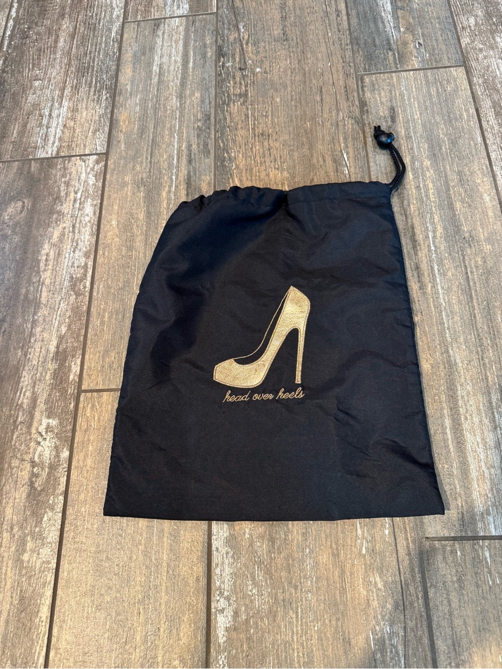 Miamica “Head over Heels” black and rose gold drawstring shoe travel bag